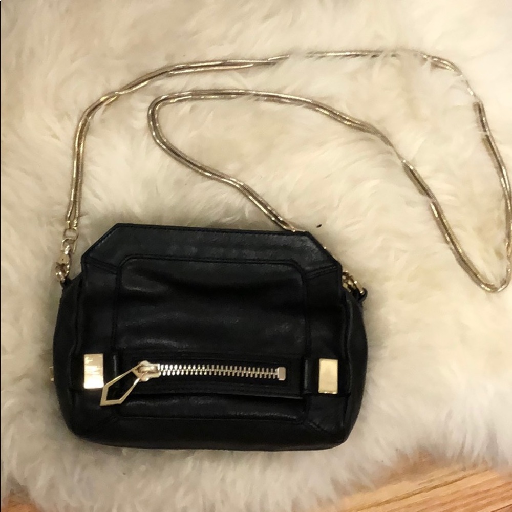 Botkier black leather purse with gold details